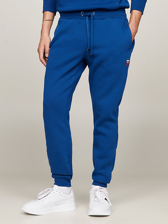 blue cuffed monogram embroidery joggers for men tommy hilfiger