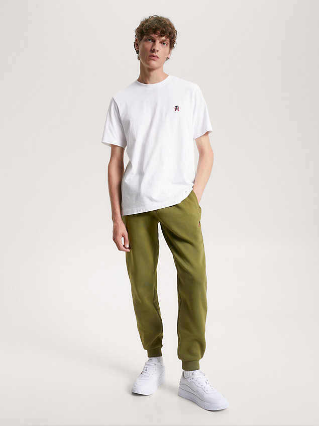 green cuffed monogram embroidery joggers for men tommy hilfiger
