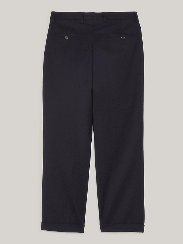 blue th monogram jacquard relaxed fit trousers for men tommy hilfiger
