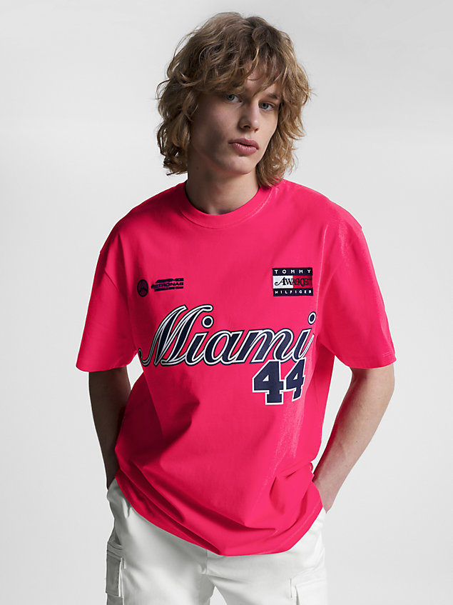 pink tommy x mercedes-amg f1 x awake ny back logo t-shirt for men tommy hilfiger