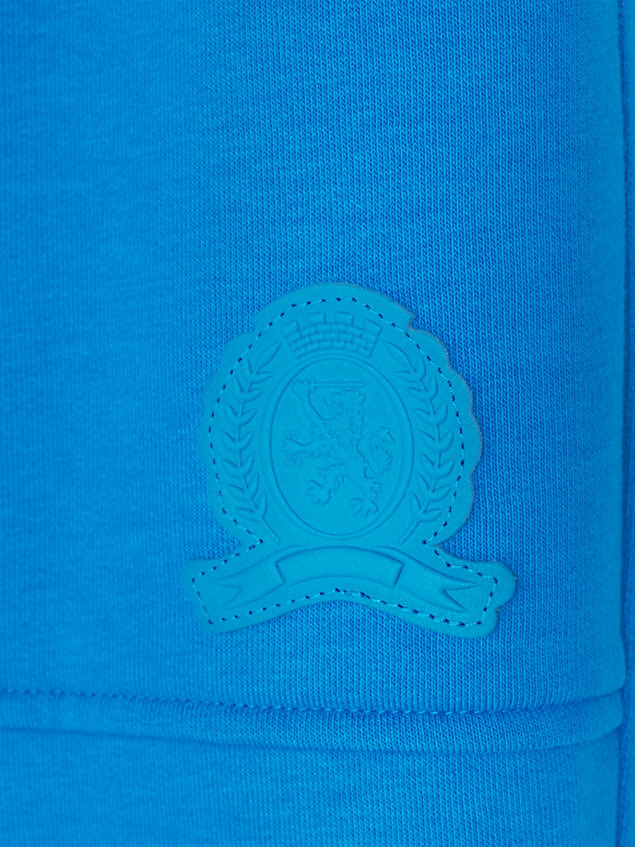 blue joggery z mankietami i naszywką z emblematem dla mężczyźni - tommy hilfiger