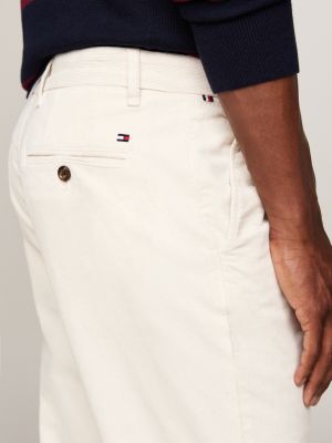 pantaloni chino straight fit in velluto bianco da uomini tommy hilfiger