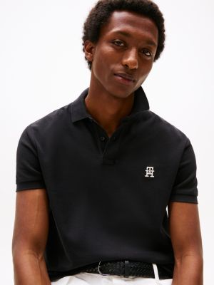 polo con monograma th a contraste negro de hombres tommy hilfiger