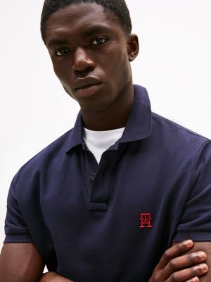 blauw polo met contrasterend th-monogram voor heren - tommy hilfiger