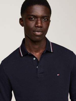 polo de manga larga ribeteado con corte slim azul de hombres tommy hilfiger