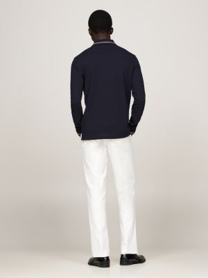 polo de manga larga ribeteado con corte slim azul de hombres tommy hilfiger