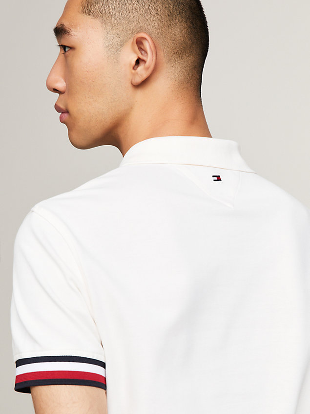 white slim fit polo met streepdetail en logo voor heren - tommy hilfiger