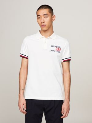 Tommy Hilfiger Homme Polo Manches Courtes Slim, Blanc (White), XS :  : Mode