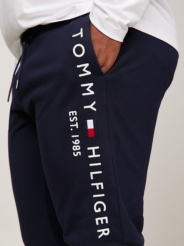 blue plus logo detail cuffed joggers for men tommy hilfiger