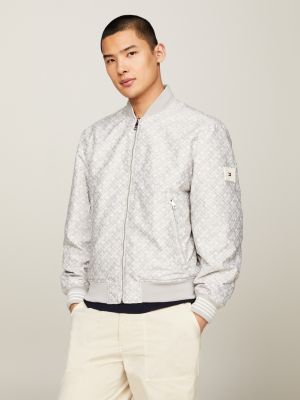 beige wasserabweisende wendbare varsity-bomberjacke für herren - tommy hilfiger