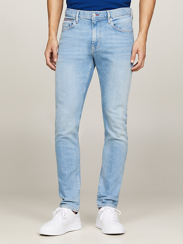 jeans bleecker slim fit con scoloriture denim da uomini tommy hilfiger