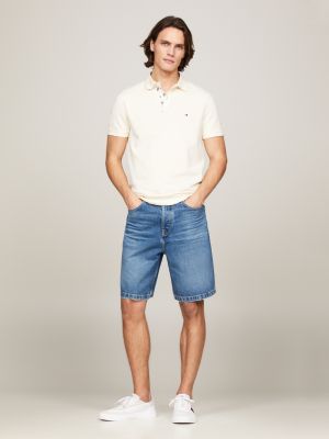 beige regular fit poloshirt mit print unter kragen für herren - tommy hilfiger