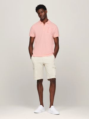 pink regular fit poloshirt mit bouclé-logo für herren - tommy hilfiger
