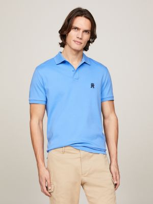 polo de interlock con monograma th bordado blue de hombres tommy hilfiger