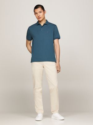 polo bitonal ribeteado de corte regular verde de hombres tommy hilfiger