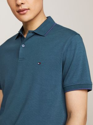 polo bitonal ribeteado de corte regular verde de hombres tommy hilfiger