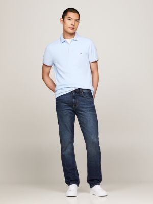 polo de corte slim con detalles ribeteados azul de hombres tommy hilfiger