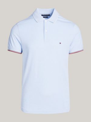 polo de corte slim con detalles ribeteados azul de hombres tommy hilfiger