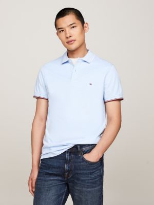 polo de corte slim con detalles ribeteados azul de hombres tommy hilfiger