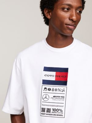 white tommy x mercedes f1 x cr care label logo t-shirt for men tommy hilfiger