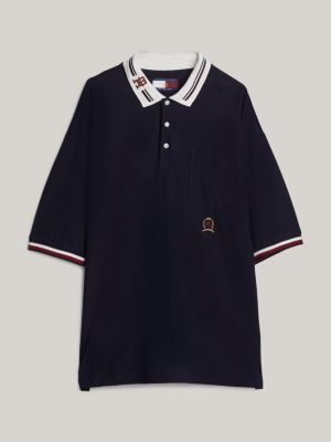 polo de corte amplio con escudo bordado azul de hombres tommy hilfiger