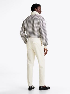 pantaloni chino harlem affusolati in velluto bianco da uomini tommy hilfiger