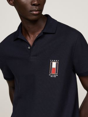 polo regular fit con logo verticale blu da uomini tommy hilfiger