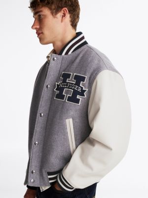 grey colour-blocked leather sleeve varsity jacket for men tommy hilfiger