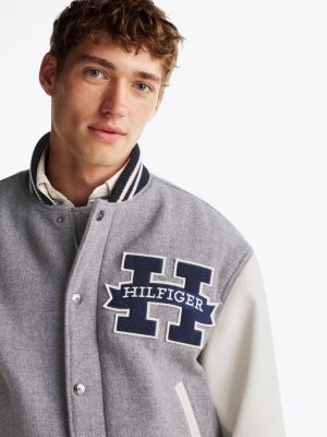 grey colour-blocked leather sleeve varsity jacket for men tommy hilfiger