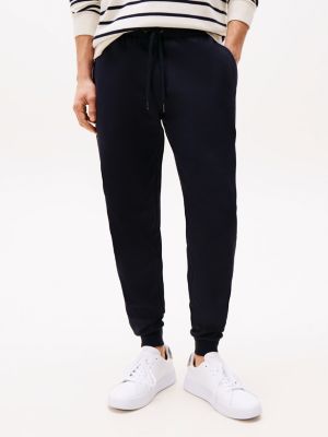 joggers in maglia tecnica con lacci in vita blu da uomini tommy hilfiger