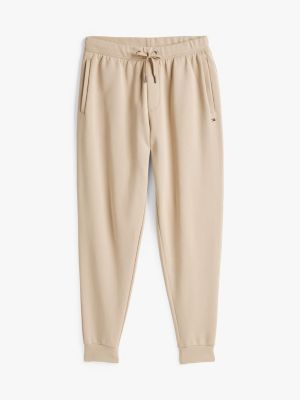 beige jogginghose mit flag-stickerei und tunnelzug für herren - tommy hilfiger