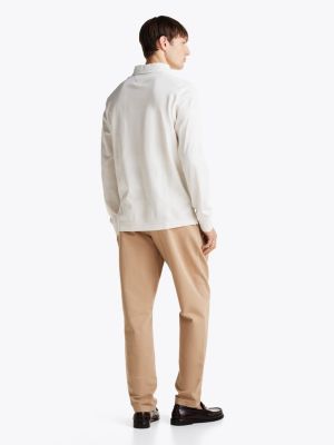 polo coupe standard à manches longues blanc pour hommes tommy hilfiger