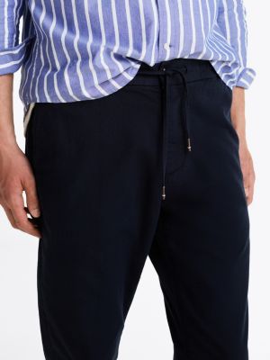 blauw harlem tapered leg chino met trekkoord voor heren - tommy hilfiger