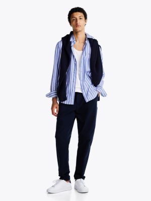 pantaloni chino harlem slim fit tinti in capo blu da uomini tommy hilfiger