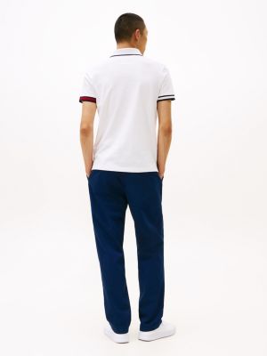 multi slim fit poloshirt mit tommy-bündchen für herren - tommy hilfiger