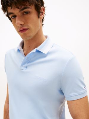 polo de corte regular azul de hombres tommy hilfiger