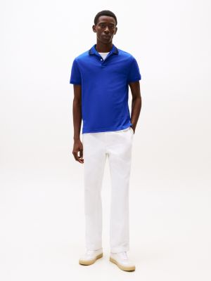 polo de corte regular azul de hombres tommy hilfiger