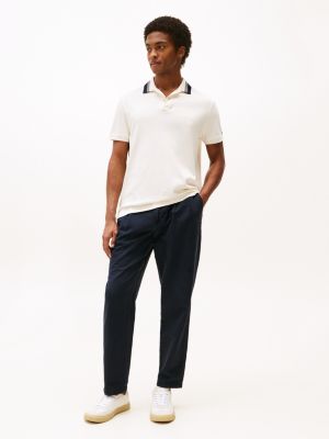 polo de corte regular blanco de hombres tommy hilfiger