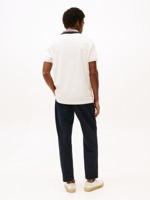 polo de corte regular blanco de hombres tommy hilfiger