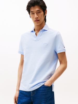 polo coupe standard en tissu éponge bleu pour hommes tommy hilfiger