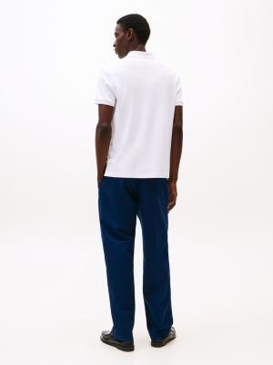 polo à patte de fermeture éclair blanc pour hommes tommy hilfiger