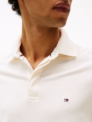 polo à patte de boutonnage invisible blanc pour hommes tommy hilfiger