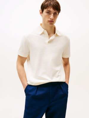 polo informal de corte regular beige de hombres tommy hilfiger