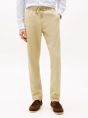 beige harlem relaxed tapered leg chinos for men tommy hilfiger