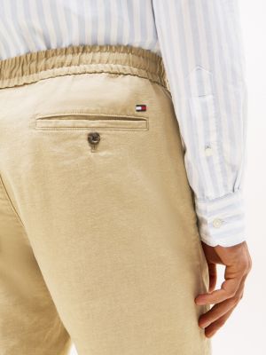 beige harlem relaxed tapered leg chinos for men tommy hilfiger