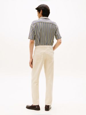 beige harlem washed tapered jeans for men tommy hilfiger