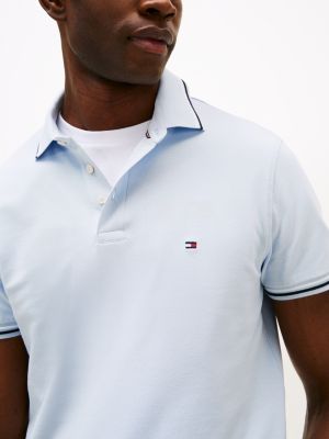 polo de corte slim con ribetes a contraste azul de hombres tommy hilfiger