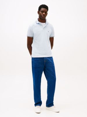 polo de corte slim con ribetes a contraste azul de hombres tommy hilfiger