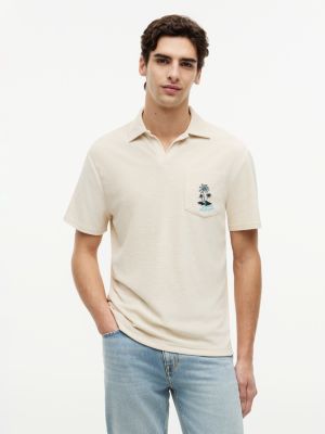 polo en tissu éponge à logo brodé beige pour hommes tommy hilfiger