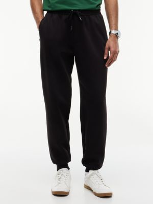 black intechno knit cuffed joggers for men tommy hilfiger